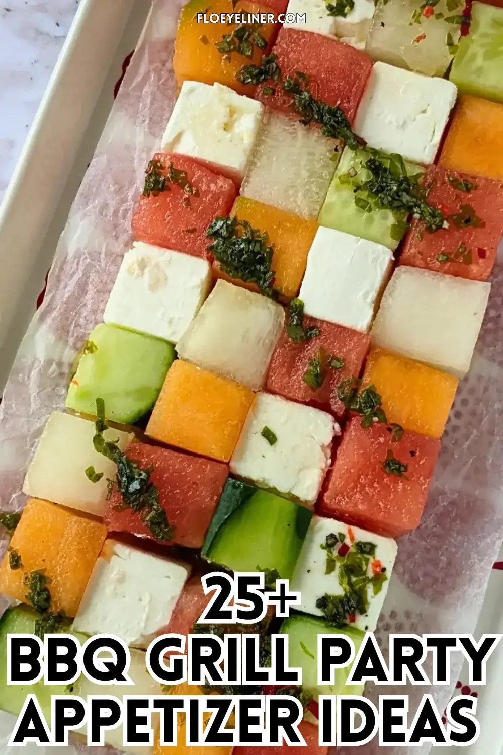 Melon Cucumber Watermelon and Feta Tetris Salad Appetizer Bites - easy fruit and cheese appetizer board with cubed melon, cucumber, watermelon and feta arranged as a grid and Tetris salad with a drizzle of spicy mint vinaigrette.
