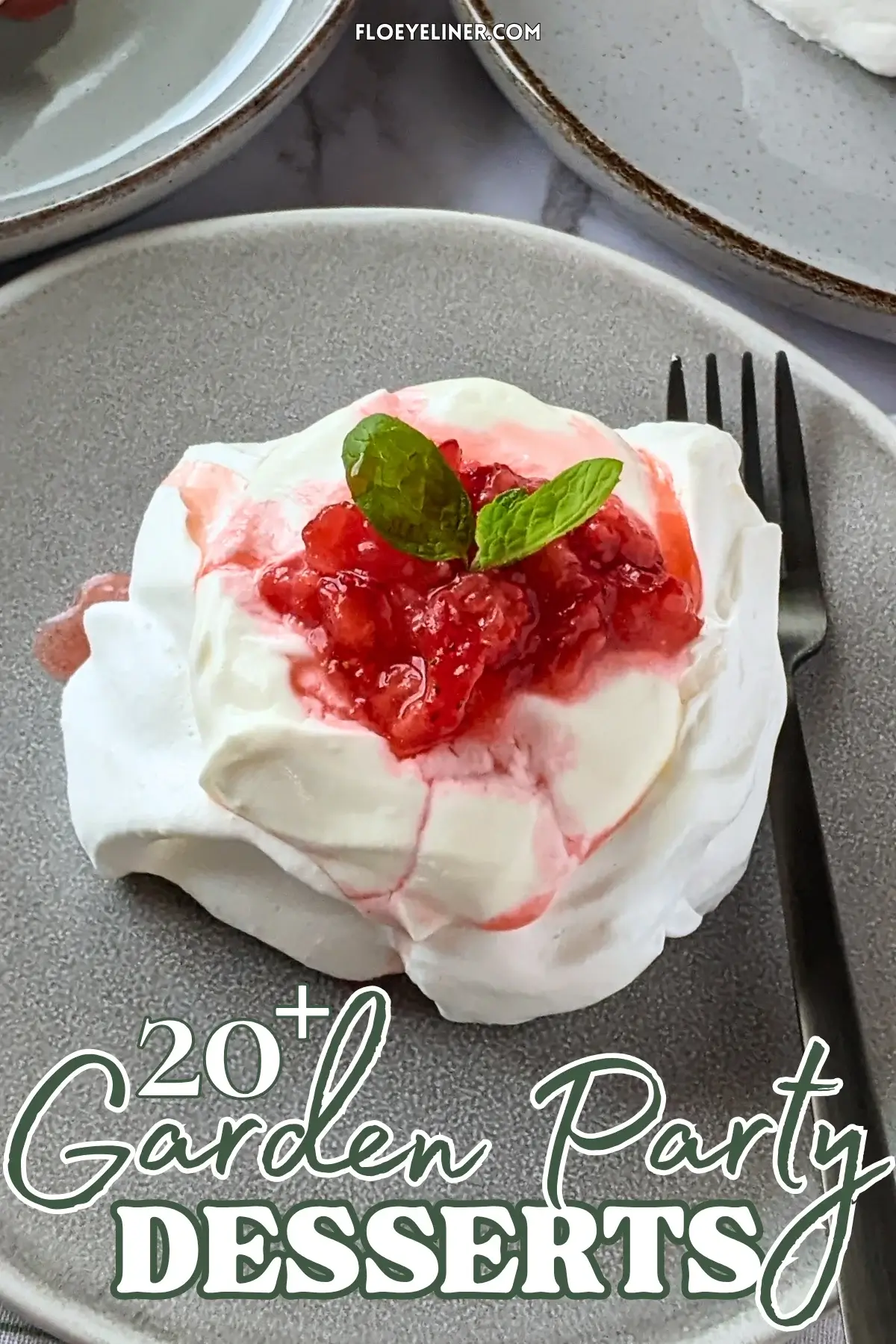 Mini Strawberry Pavlovas With Whipped Greek Yogurt - mini pavlova nests filled with freshly crushed strawberries and a whipped cream-Greek yogurt mix, topped with more crushed strawberries and strawberry juice for garnish.