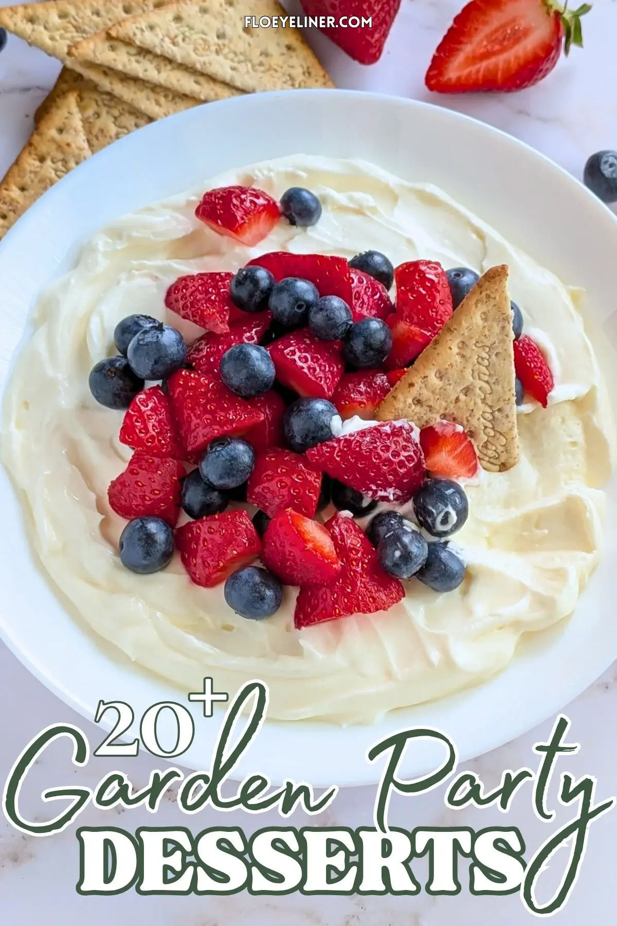 Mixed Berry Cheesecake Dessert Dip - fluffy cheesecake dip dessert made with cream cheese, heavy whipping cream, Greek yogurt, and topped with fresh strawberries and blueberries.
