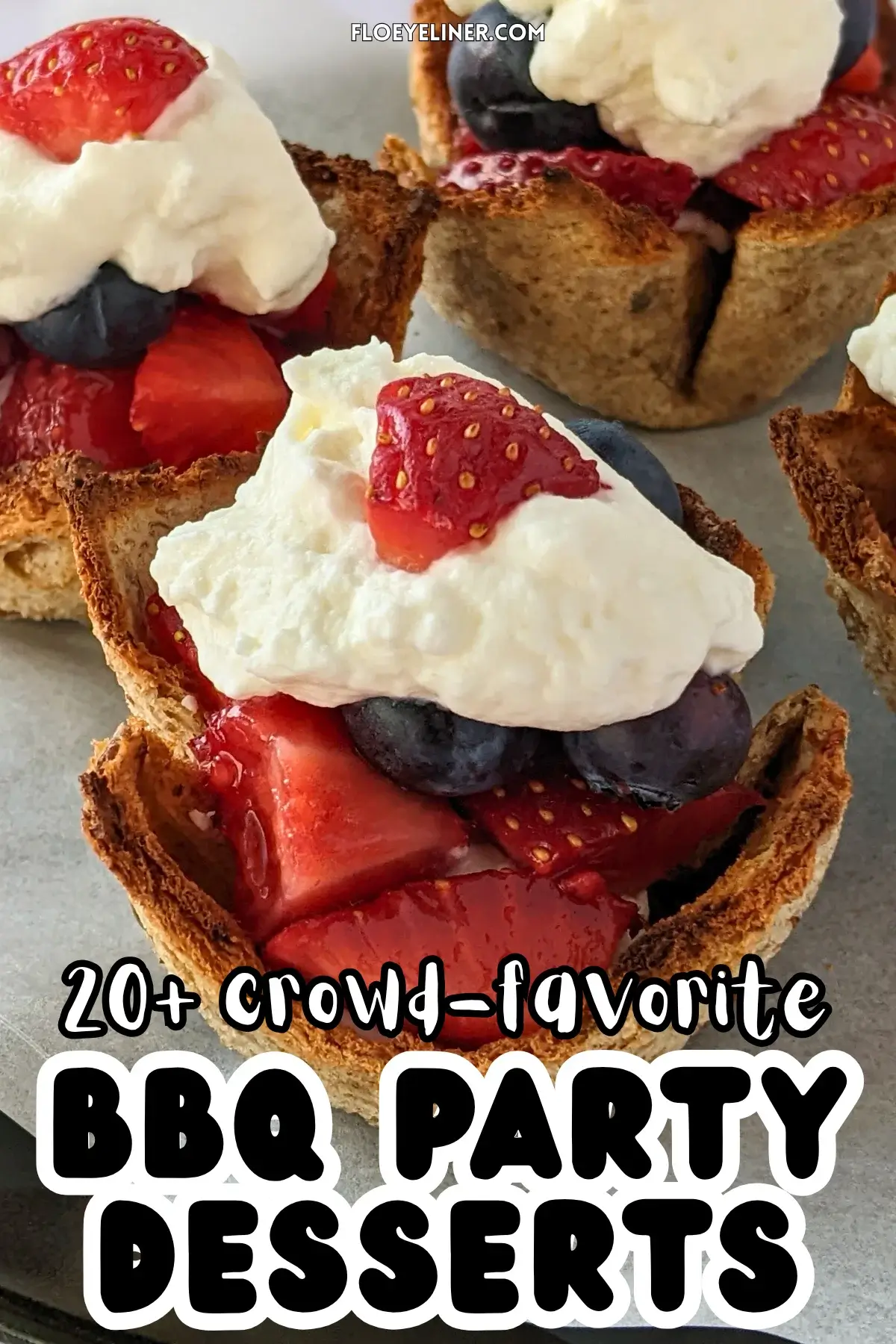 Mixed Berry Dessert Toast Cups With Whipped Cream - muffin-tin baked mini dessert cups made from white bread, filled with a spoon of sweet ricotta and mixed berries like strawberries and blueberries, topped with whipped cream.