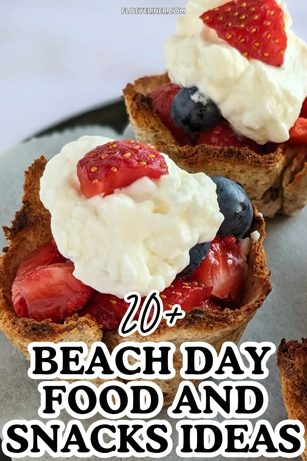 Mixed Berry Dessert Toast Cups With Whipped Cream - muffin-tin baked mini dessert cups made from white bread, filled with a spoon of sweet ricotta and mixed berries like strawberries and blueberries, topped with whipped cream.
