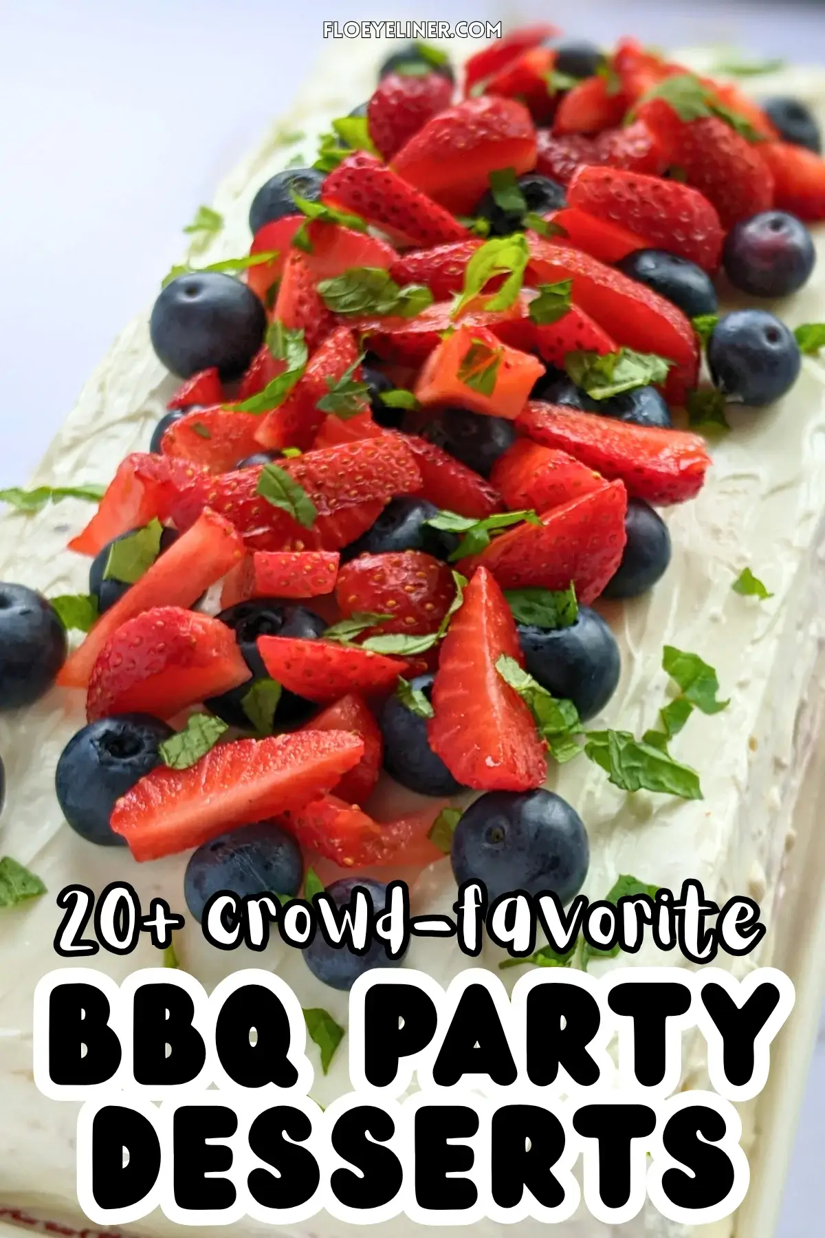 Mixed Berry Layer Cake With Mascarpone Greek Yogurt Frosting - triple-layer sponge cake with a blueberry-strawberry filling and mascarpone-Greek yogurt frosting, topped with fresh strawberries and blueberries.
