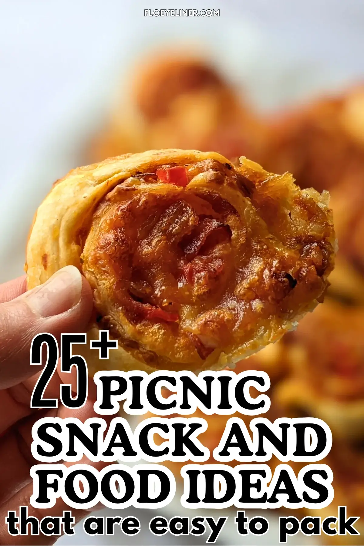 Pizza Pinwheels - Golden brown pizza pinwheels filled with tomato sauce, salami, and melted cheese.