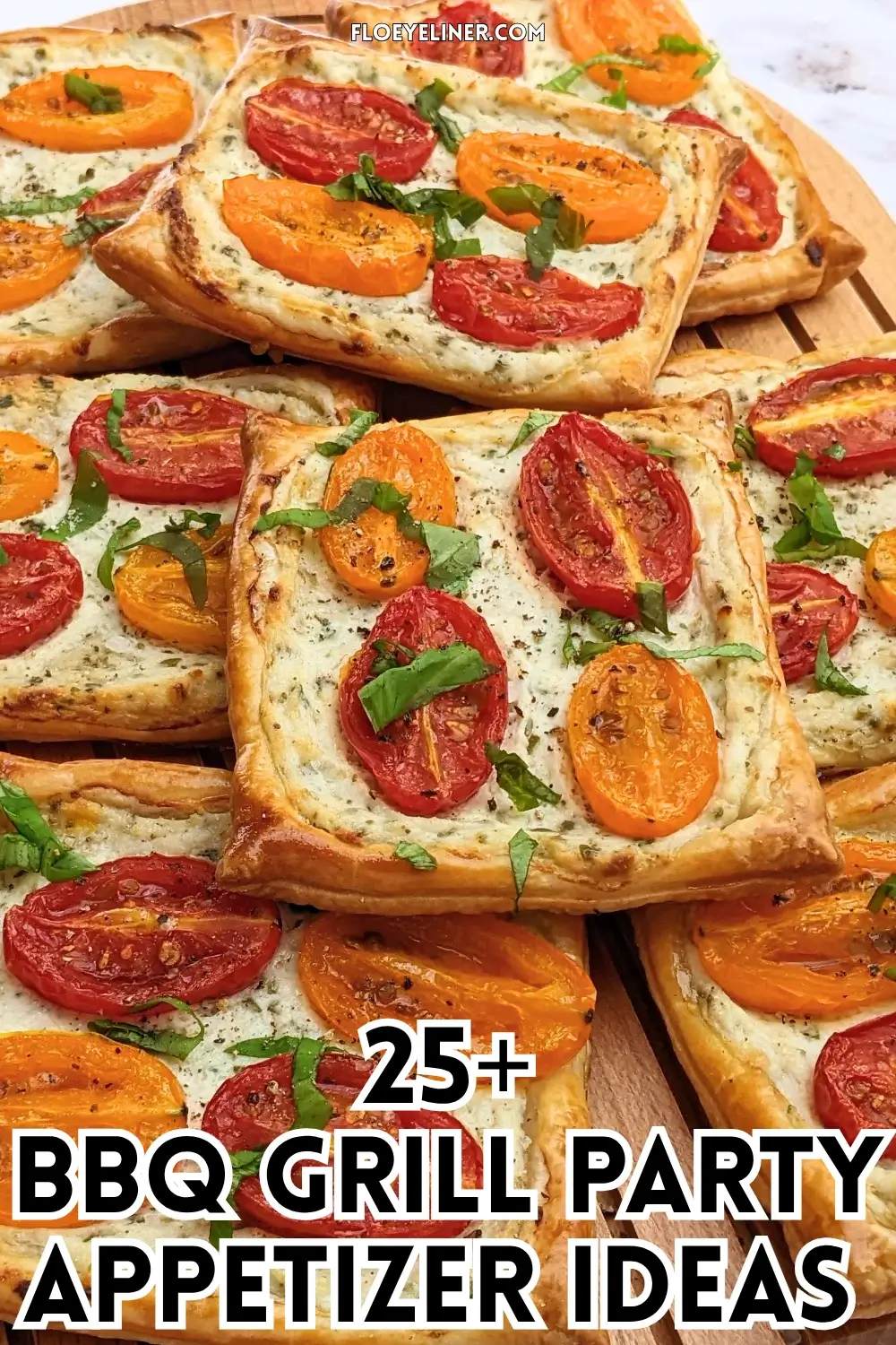 Roasted cherry tomato tarts with puff pastry - a puff pastry appetizer filled with ricotta and parmesan and topped with red and yellow cherry tomatoes and basil.