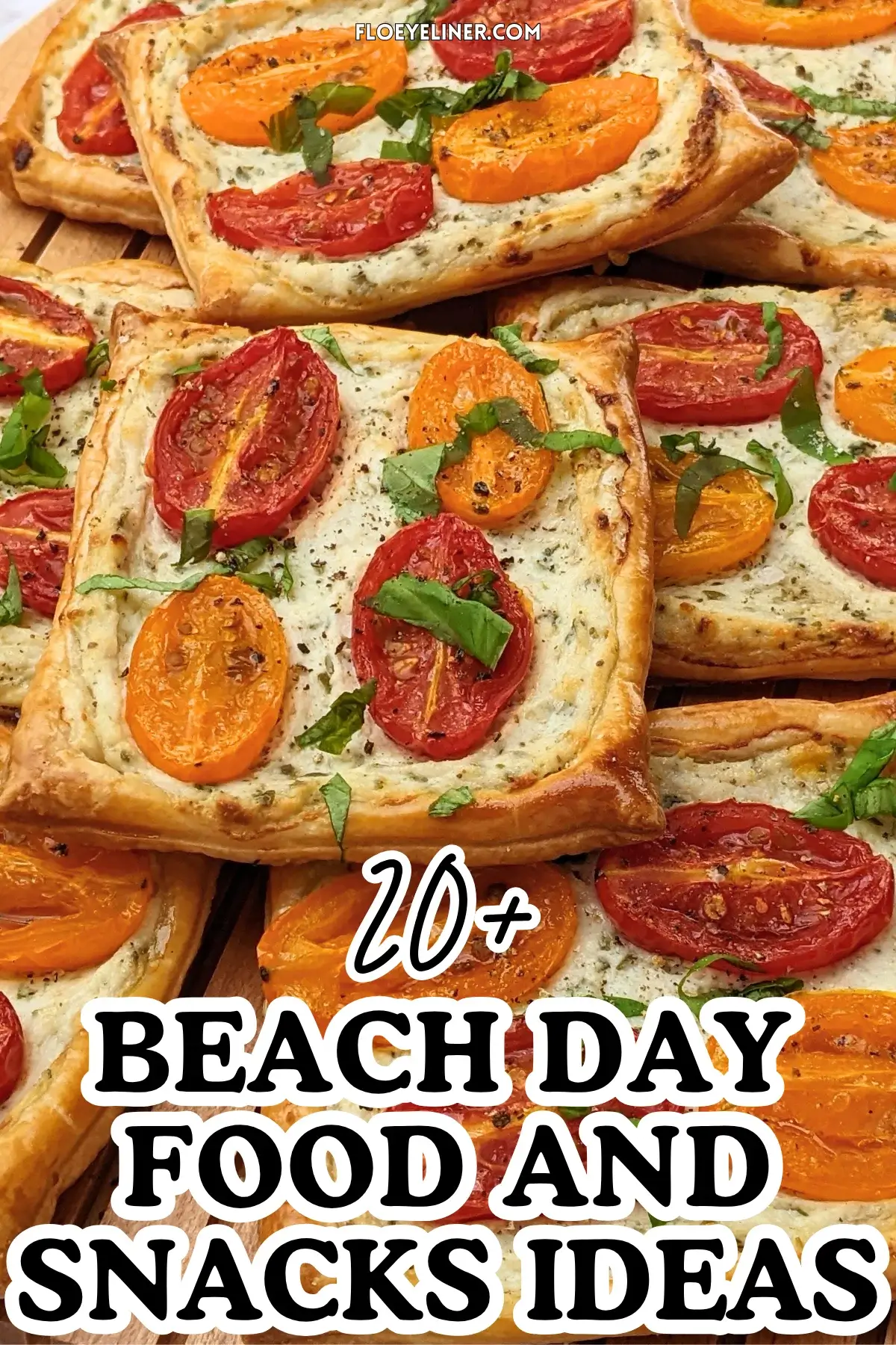 Roasted cherry tomato tarts with puff pastry - a puff pastry appetizer filled with ricotta and parmesan and topped with red and yellow cherry tomatoes and basil.