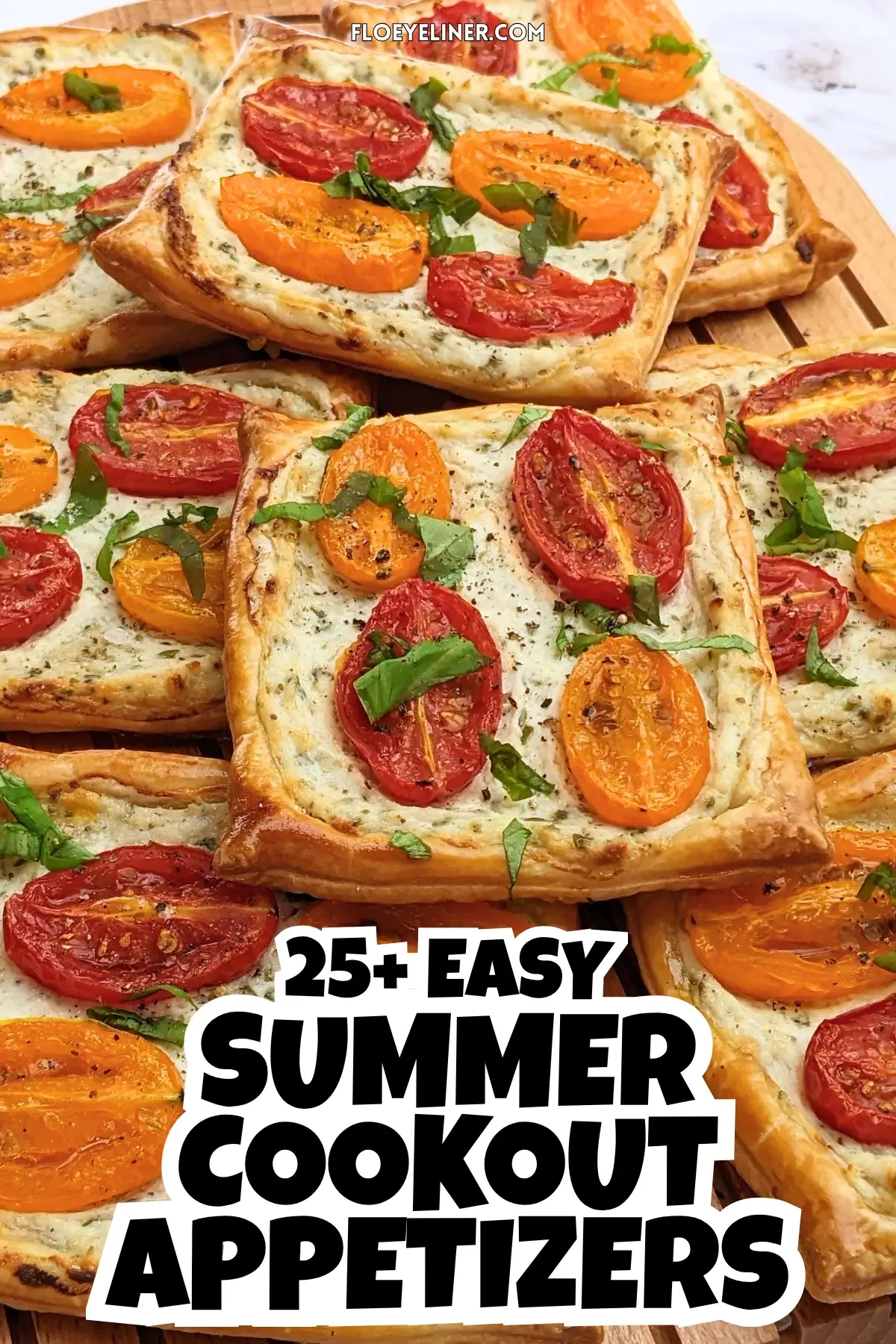Roasted cherry tomato tarts with puff pastry - a puff pastry appetizer filled with ricotta and parmesan and topped with red and yellow cherry tomatoes and basil.
