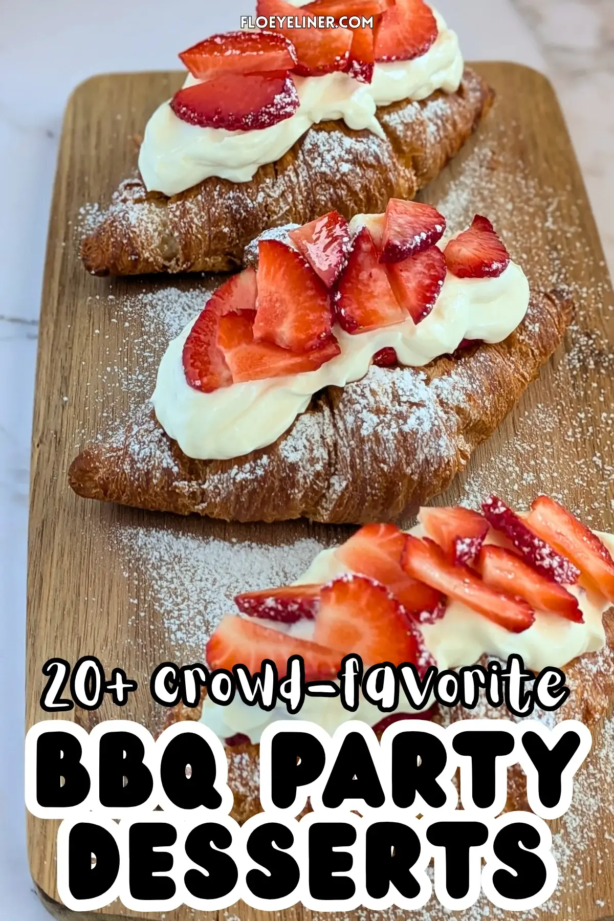Strawberry Cheesecake Croissants - easy strawberry desserts made with store-bought croissants cut open from the top and filled with a creamy cheesecake filling, layered with fresh strawberries and another generous layer of cheesecake filling, topped with fresh strawberries and powdered sugar for garnish.