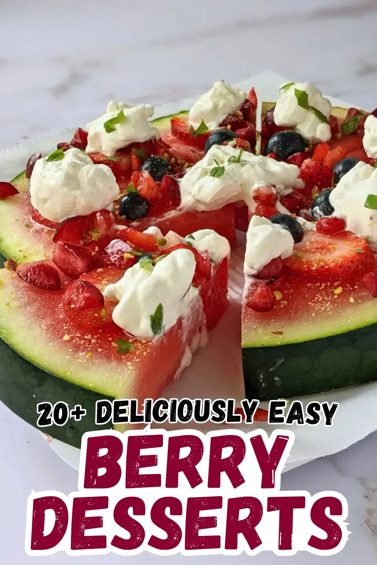 Watermelon Fruit Pizza With Berries and Whipped Cream - fruity dessert pizza on a base of a fresh watermelon slice, topped with blueberries, strawberries, cherries, dollops of whipped cream, and crushed pistachios.