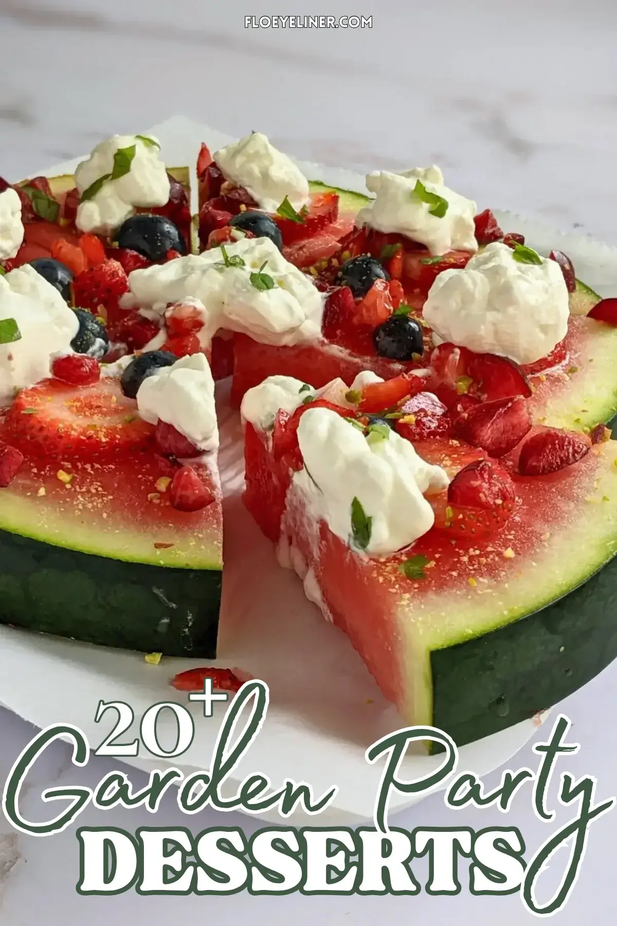 Watermelon Fruit Pizza With Berries and Whipped Cream - fruity dessert pizza on a base of a fresh watermelon slice, topped with blueberries, strawberries, cherries, dollops of whipped cream, and crushed pistachios.