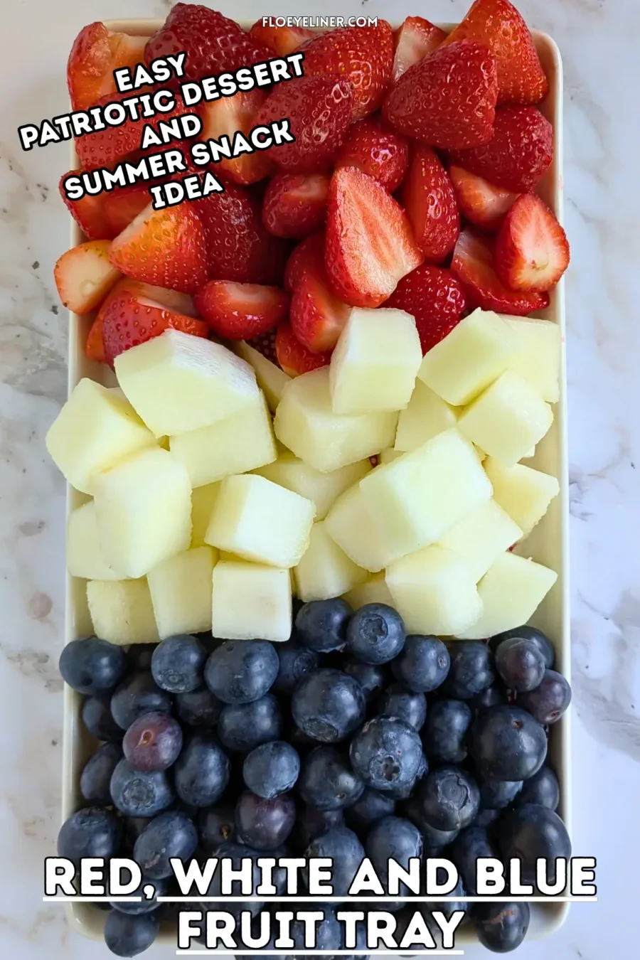 Red, White and Blue Fruit Tray - easy festive party fruit platter made with cut red strawberries, white honeydew melon, and blue blueberries for a red, white, and blue themed summer dessert or snack board.